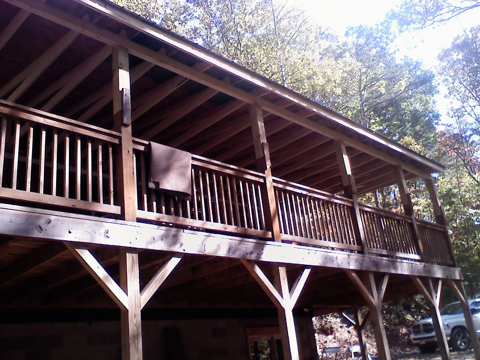 Timber framing under a new elevated porch and deck — Roof Leak Repair in Potrero by Roofing Brothers